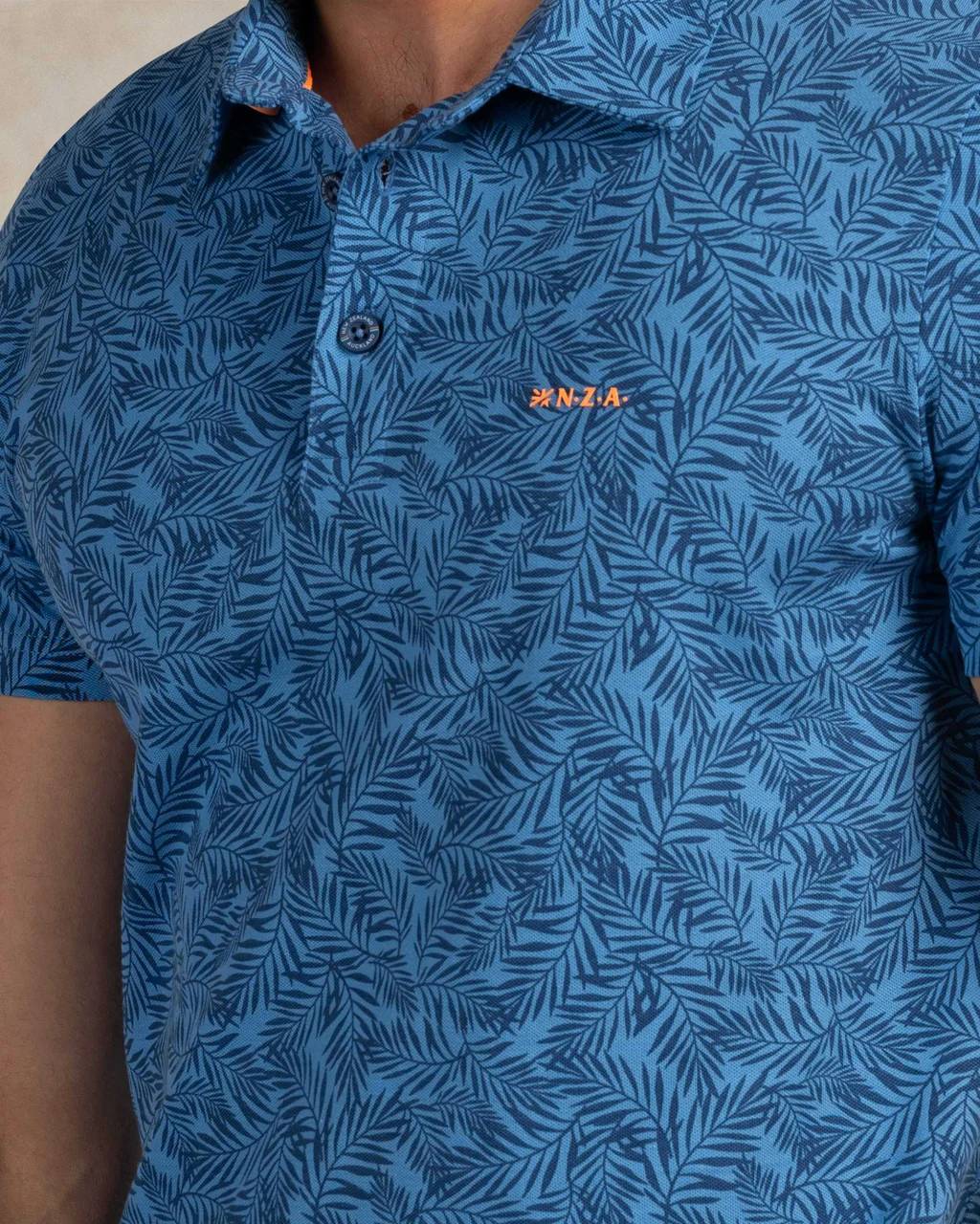 NZA 26CN111NS/L Poloshirt - Blau / Palmen - L NZA 26CN111NS/L Poloshirt - Blau / Palmen - L