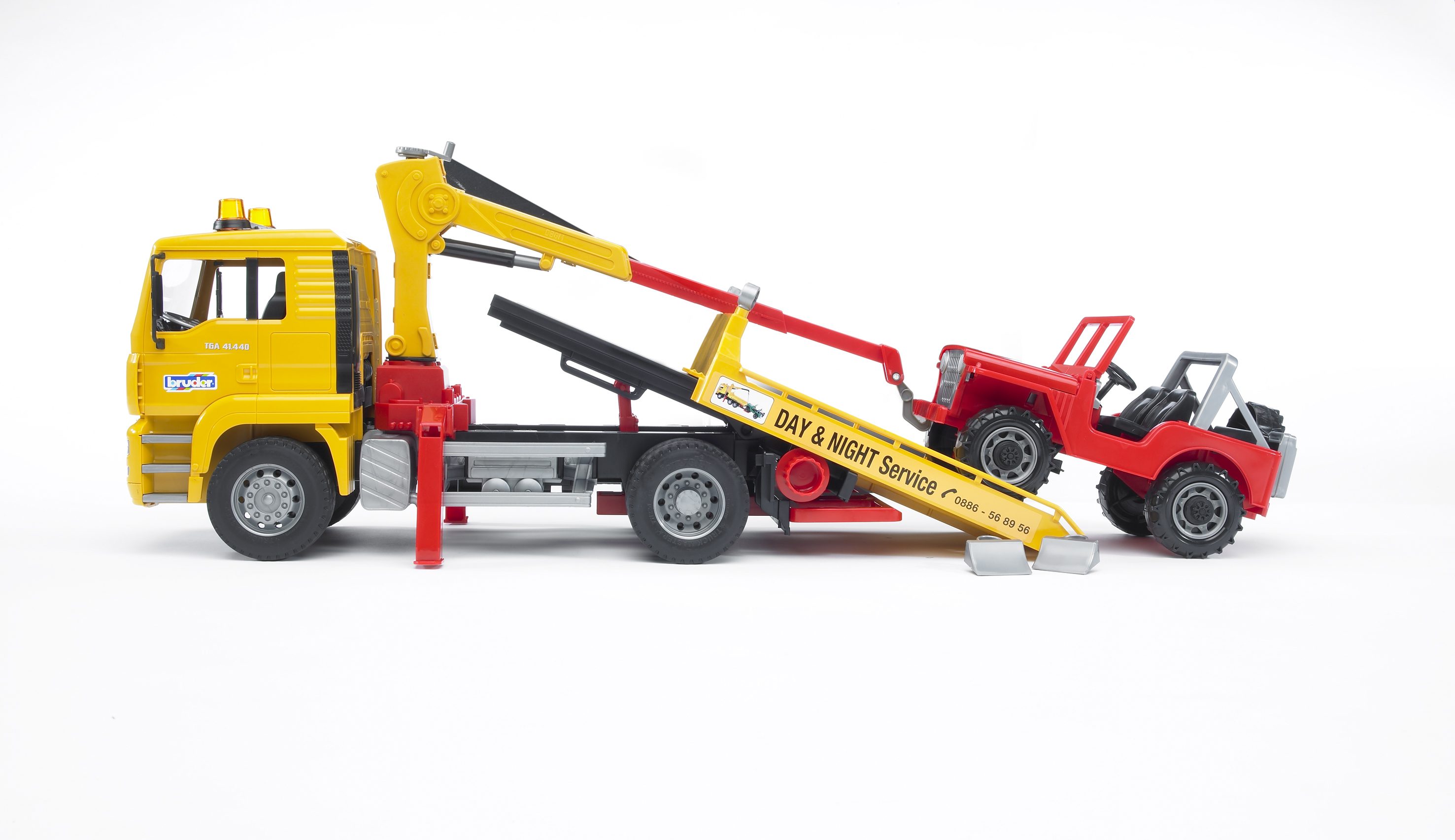 BRUDER 02750 - MAN TGA Abschlepp-LKW mit Geländewagen Ohnee Light And Sound Modul) - Bild 6