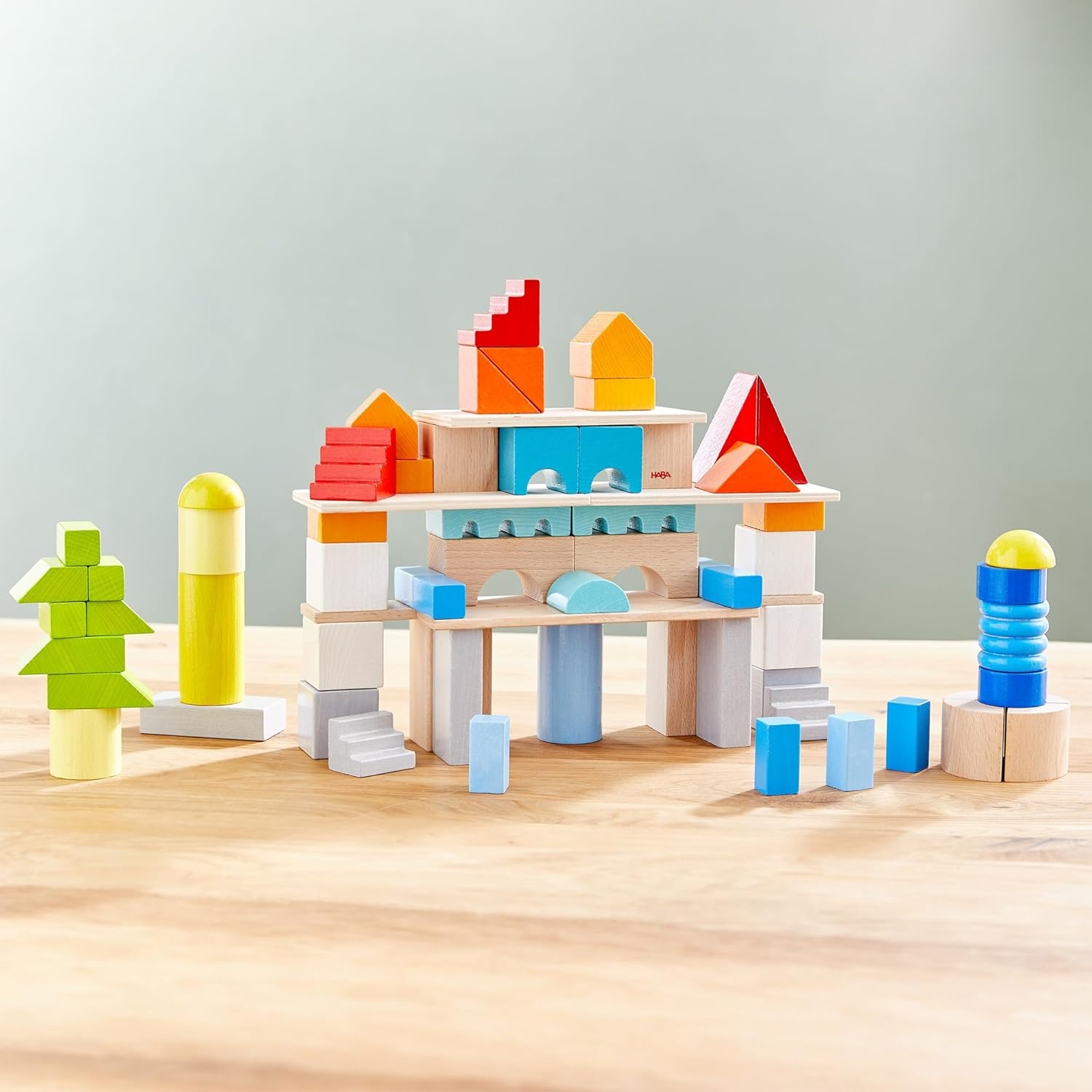 HABA 85 Basisbausteine bunt, Set mittel - Hochwertiges Holzbaustein-Set mit Aufbewahrungstasche HABA 85 Basisbausteine bunt, Set mittel - Hochwertiges Holzbaustein-Set mit Aufbewahrungstasche
