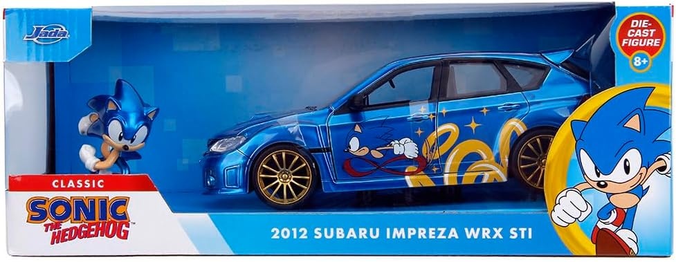 Jada 253255087 Sonic Subaru Impreza WRX STI 2012 - Modellauto 1:24 mit Figur Auto, Fahrzeug, Maschine, Rad, Leichtmetallrad