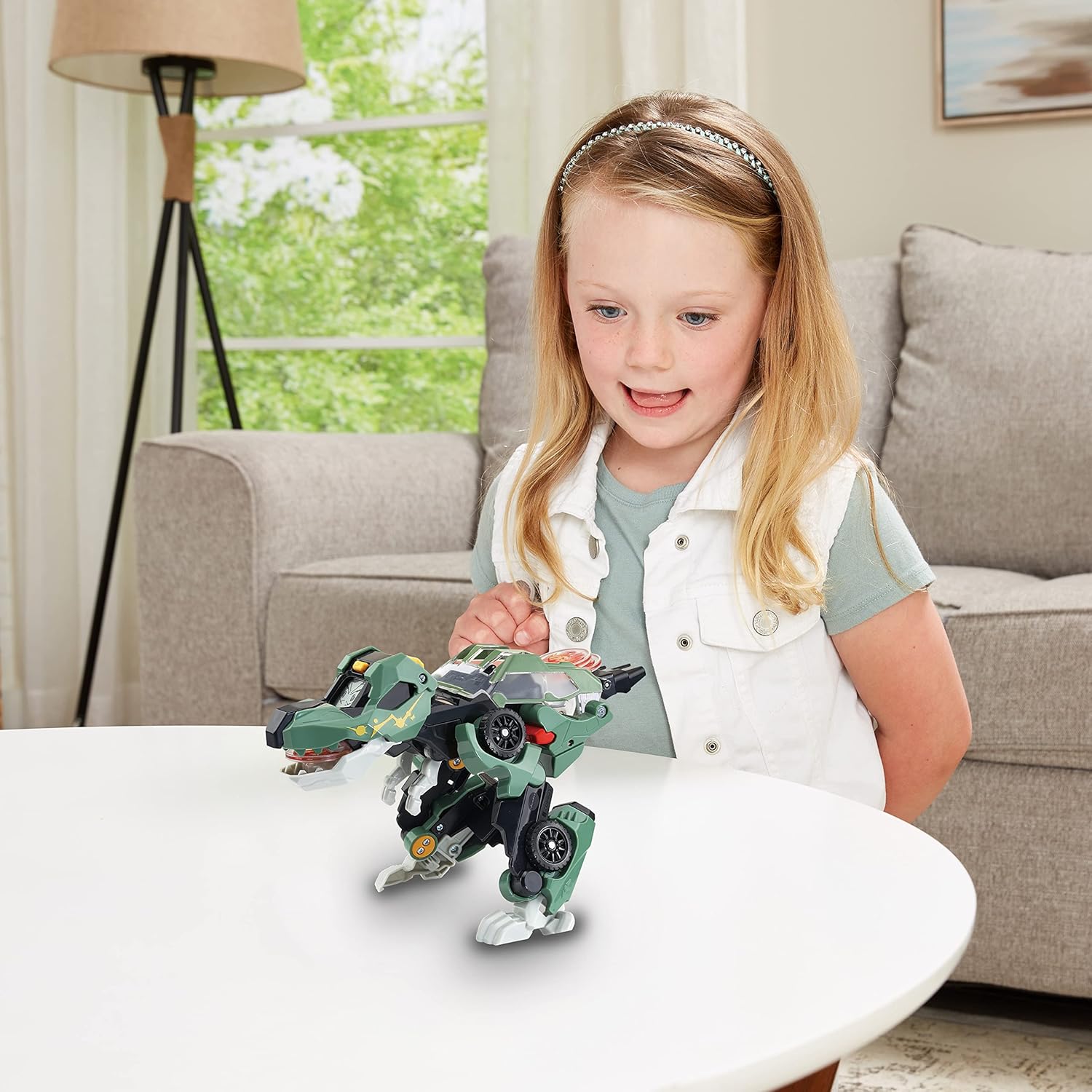 VTech Switch & Go Dinos Launcher-T-Rex, interaktives Dino-Spielzeug ab 3 Jahren VTech Switch & Go Dinos Launcher-T-Rex aus grünem Kunststoff, verwandelt sich von Dino zu Fahrzeug, LCD-Effekte, 3 Launch Discs, Sound & Modus-Sätze, kindersicheres Batteriefach, ab 3 J., Junge, Kind, Männlich, Person, Junge, Kind, Männlich, Person
