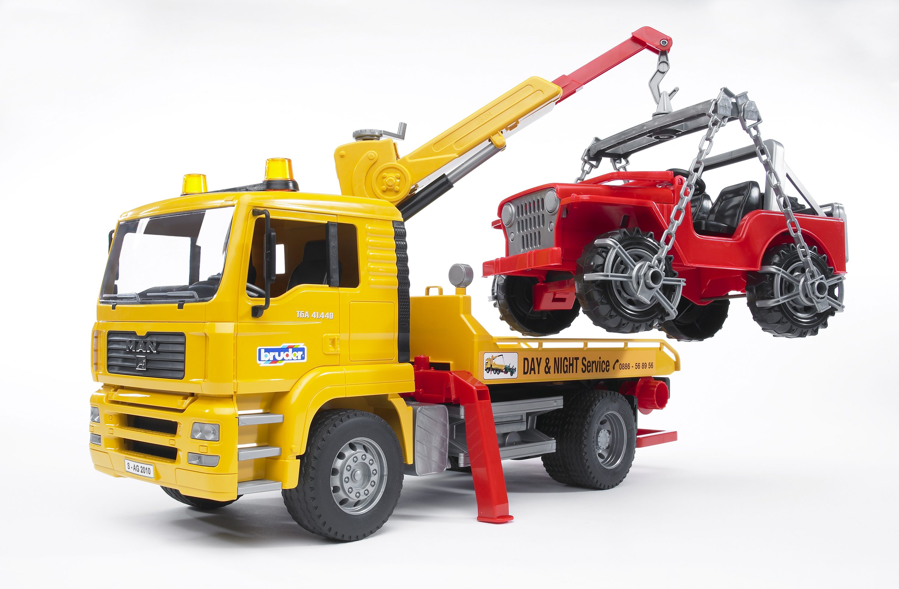 BRUDER 02750 - MAN TGA Abschlepp-LKW mit Geländewagen Ohnee Light And Sound Modul) - Bild 2 BRUDER 02750 - MAN TGA Abschlepp-LKW mit Geländewagen Ohnee Light And Sound Modul) - Bild 2