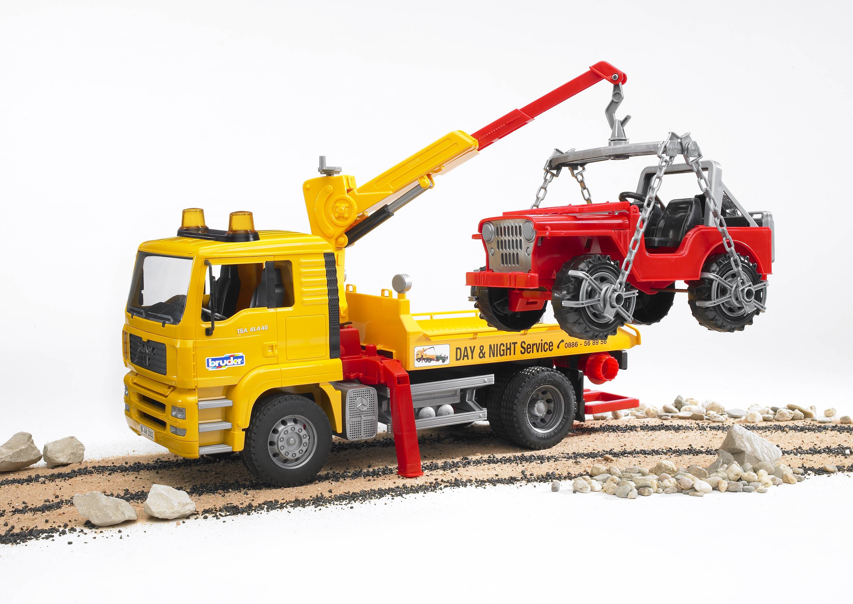 BRUDER 02750 - MAN TGA Abschlepp-LKW mit Geländewagen Ohnee Light And Sound Modul) - Bild 8 BRUDER 02750 - MAN TGA Abschlepp-LKW mit Geländewagen Ohnee Light And Sound Modul) - Bild 8