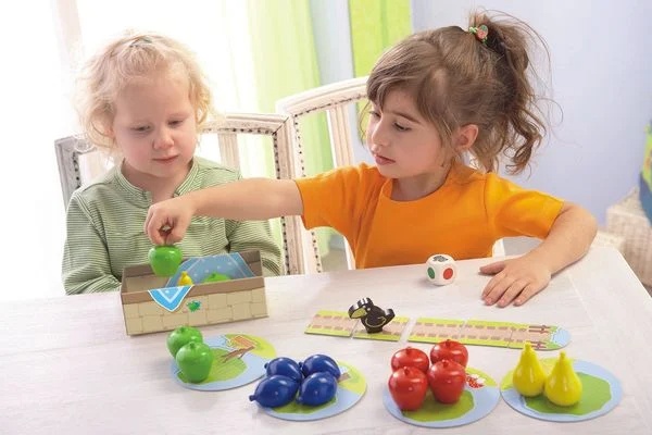 HABA Meine ersten Spiele: Erster Obstgarten - Kooperatives Würfelspiel mit Holzfiguren