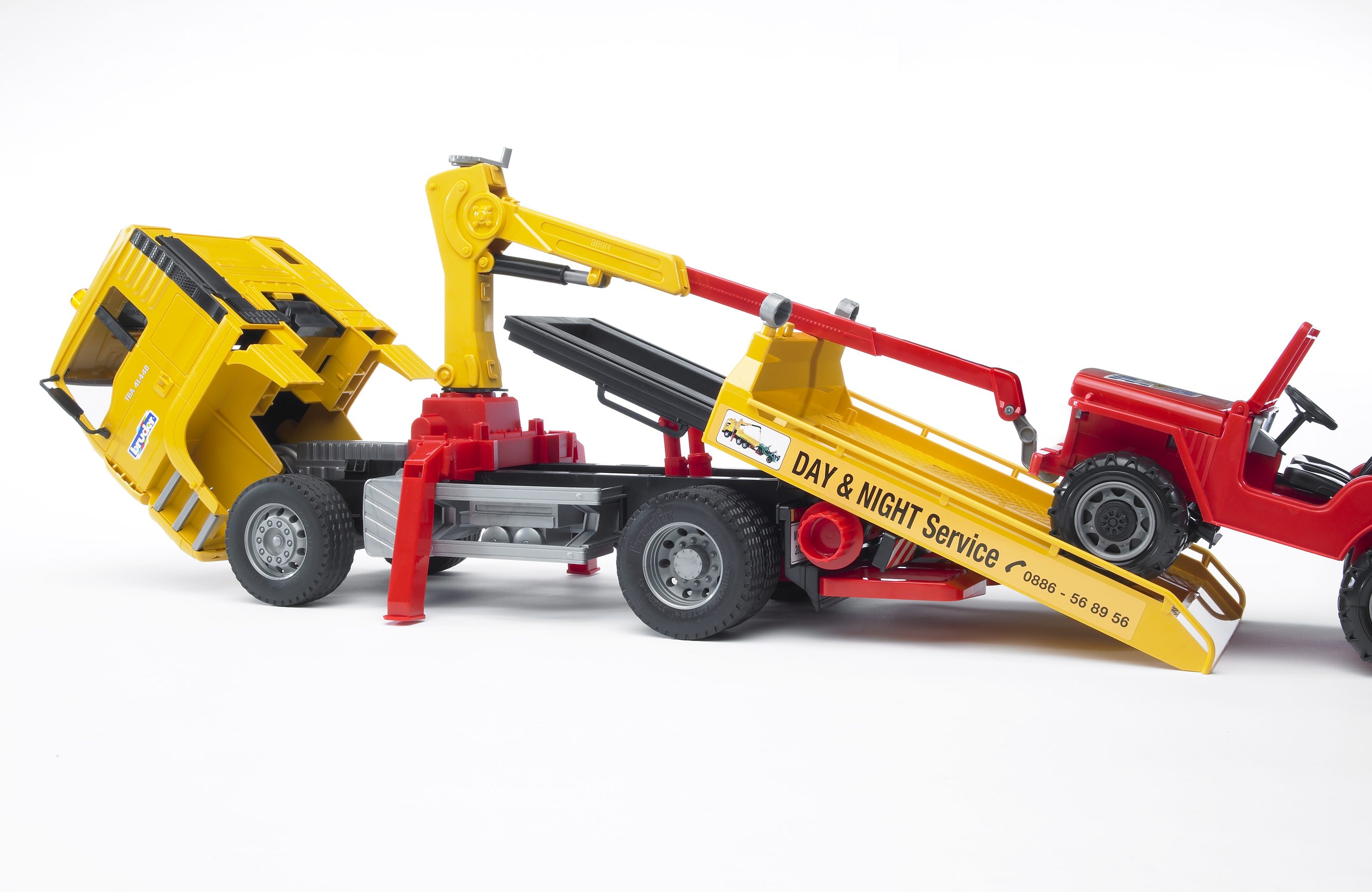 BRUDER 02750 - MAN TGA Abschlepp-LKW mit Geländewagen Ohnee Light And Sound Modul) - Bild 5 BRUDER 02750 - MAN TGA Abschlepp-LKW mit Geländewagen Ohnee Light And Sound Modul) - Bild 5