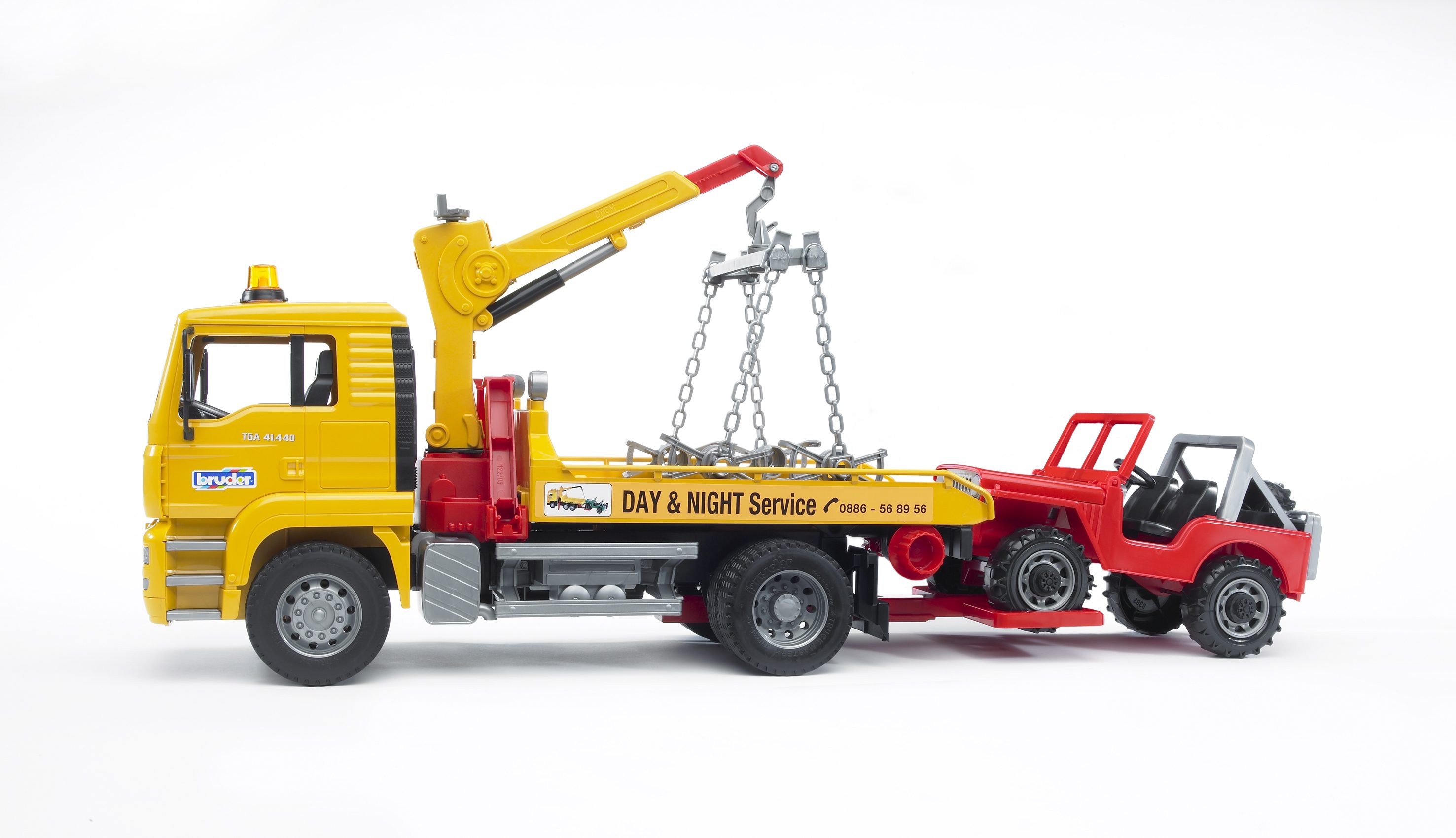 BRUDER 02750 - MAN TGA Abschlepp-LKW mit Geländewagen Ohnee Light And Sound Modul) - Bild 7